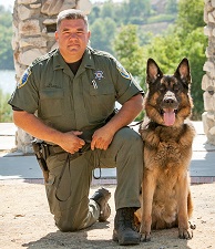 Warden David McNair and K-9 Reno