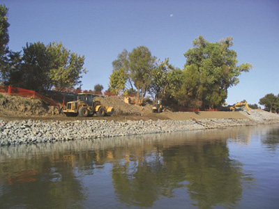 construction along a river bank