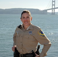 warden in front of San Francisco Bay